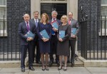photograph of five person business task force