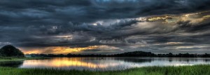 landscape photograph of lake with dramatic cloud cover by by Mark Freeth https://flic.kr/p/oa6jdY