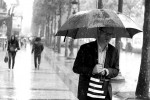 photograph of man with umbrella on city sidewalk in the rain by luisjoRN https://flic.kr/p/fWDPjL